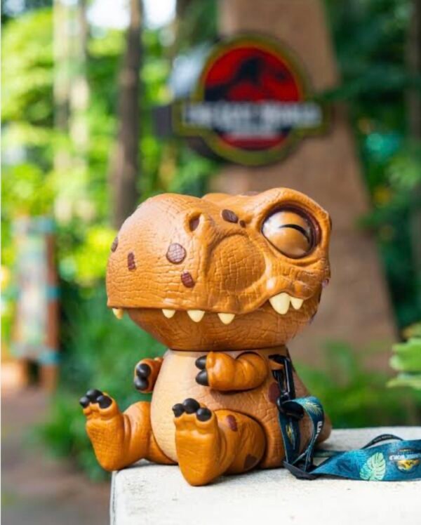 Palomera Dinosauro bebé T-Rex Jurassic World Universal Studios